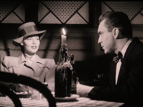 O'Brien questioning his murdered client's one-time lover (Ava Gardner) in THE KILLERS